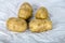 Four baker`s potato ready to cook