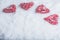 Four beautiful romantic vintage hearts on a white frosty snow background. Love and St. Valentines Day concept.