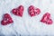 Four beautiful romantic vintage hearts on a white frosty snow background. Love and St. Valentines Day concept.