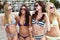 Four Beautiful Young Women Enjoying The Beach
