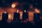 Four black burning candles on advent wreath, dramatic and contract