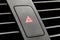 Four blinking light indicator button inside modern luxury car