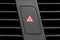 Four blinking light indicator button inside modern luxury car