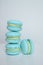 Four blue blueberry french macaroons with dor blue cheese cream inside