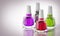 Four bottles of nail polish isolated on white background. 3D illustration