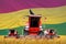 Four bright red combine harvesters on farm field with flag background, Ghana agriculture concept - industrial 3D illustration