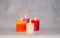 Four burning colored candles