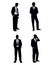 Four businessman silhouettes