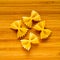 Four butterflies for italian pasta on wood background. Dietary food.