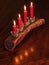 Four candles in a timber plank with Christmas decoration close-up