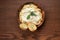 Four cheese pasta with garlic bread on wooden background