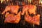 Four Chicken Leg Quarter Roasted On Hot BBQ Flaming Grill