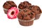 Four chocolate muffins and flower