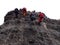 Four climbers rappelling using the single rope technique