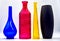 Four colored bottles are Radom, placed by color CMYK