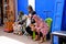 Four colorful Arabic women in the Medina of Essaouira