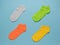 Four colorful beautiful socks on a blue background. Flat lay