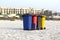 Four colorful recycle bins on Beach Sand- 21 JULY 2017..