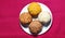 Four coloured Laddu: Indian party sweet