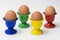 Four colourful egg holders