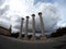 Four columns against a very beautiful sky with clouds