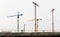 Four cranes on building site in Hamburg. Industrial area.