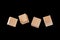 Four cubes floating in the air isolated on a black background, layout for Your design
