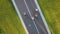 Four cyclists on the road, top view.