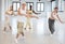 Four dancers exercising contemporary dance movements