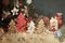 Four decorative wooden Christmas trees with carved letters xmas and delicacy in the form of a small bones for pets.