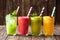 Four delicious smoothies in four glasses