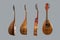 Four different mandolins arranged vertically mandolins