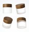 Four different views of frosted glass cream jar with wooden cap, 3D render cosmetic product packaging isolated on white