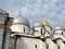 Four domes of the ancient St. Sophia white Stone Cathedral in Novgorod, Russia, one dome is gilded