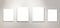 Four empty isolated on white paintings on the wall with gallery lighting. Space for text