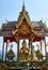 Four-faced Buddha Phra Phrom, Brahma statue in front of the Crystal Pagoda Chedi Kaew Wat Tha Ton