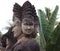 Four-faced deity sculpture at the Buddha park