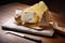 Four famous Italian cheeses on an old tavern table: Asiago, Taleggio, Pecorino and caciotta with pistachios.