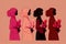 Four female silhouettes in hijabs on a pink background with flowers. Generative AI