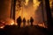 four firefighters walk through a forest with flames