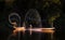 Four fishermen artistic poses with water on Huong river Vietnam