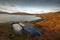 Four fishing boats on the peaceful shore