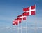 Four flapping danish flags