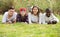 Four friends on countryside field