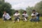 Four friends read newspapers