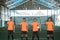 four futsal players with thumbs up standing in a row