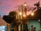 Four garden lamps at dusk