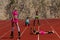 Four girls doing break time of exercises in kangoo jumping boots,