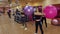 Four girls doing sports with fitness balls in gym.