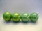 Four green marbles
